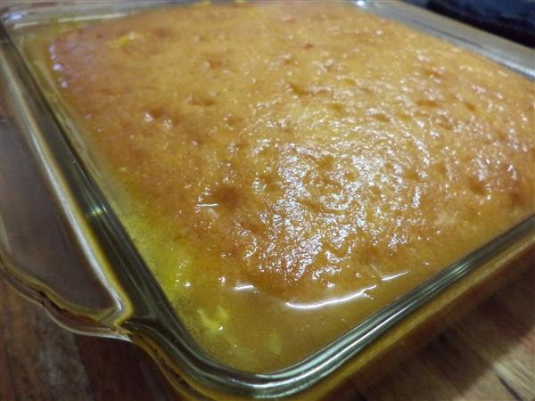 Gluten free orange drizzle cake with sauce